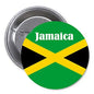 Jamaica flag pinback button, round metal back with Jamaica word and green, gold cross