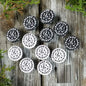 Round marching band member pin badges with black enamel and white musical note text