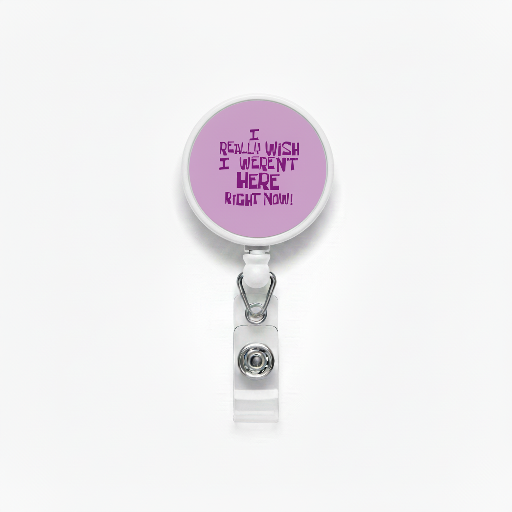 Retractable badge reel with purple circular face and metal clip