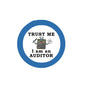 Round blue pinback badge: “TRUST ME I am an AUDITOR” with auditor icon