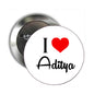 Round pin back badge: 'I Love Aditya' with red heart