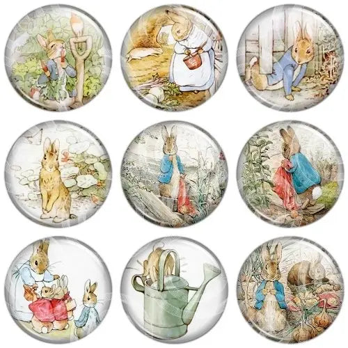 Peter Rabbit pinback badge set, nine round button badges with cartoon bunny scenes.
