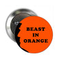 2.25-inch orange pinback button with black profile silhouette and "BEAST IN ORANGE" text