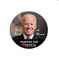 Round pinback badge with Joe Biden portrait, red heart, and text "Prayers for Biden"