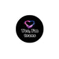 Trans enamel pinback badge, black with purple and blue heart and “Yes, I’m trans” text