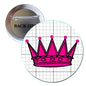 Round pinback button with magenta crown illustration, silver border and metal pin clasp
