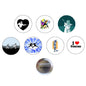 Set of 7 round fencing Olympic pinback buttons with colorful fencing icons; one shows back side