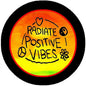 2.25-inch pinback button: black border, 'Radiate Positive Vibes' heart circle