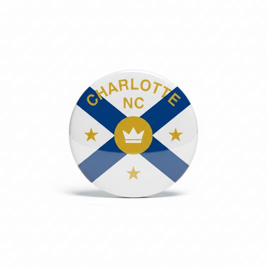 Circular Charlotte NC flag pinback badge with blue ribbon and gold crown