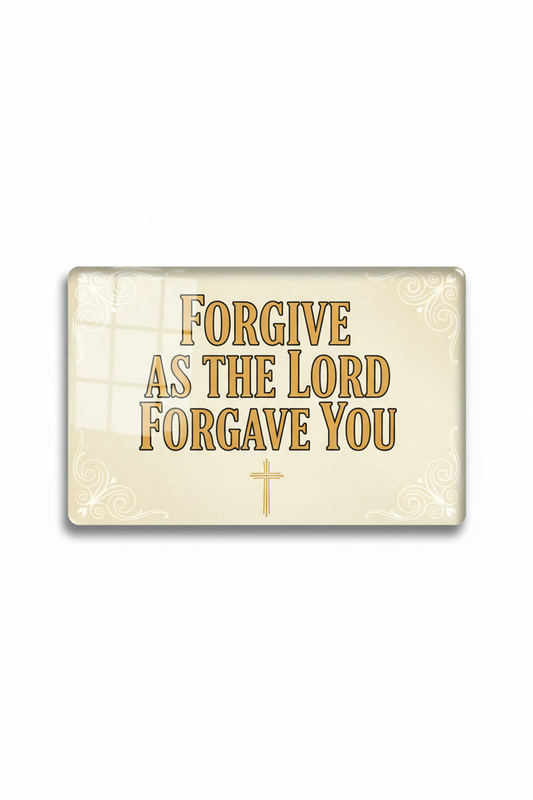 A rectangular plaque or sign with the phrase 'FORGIVE AS THE LORD FORGAVE YOU' in large gold lettering on a cream background, decorated with subtle scrollwork and a small cross below the text.