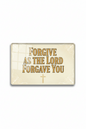 A rectangular plaque or sign with the phrase 'FORGIVE AS THE LORD FORGAVE YOU' in large gold lettering on a cream background, decorated with subtle scrollwork and a small cross below the text.