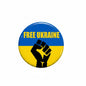 Round pinback button with black rim, FREE UKRAINE blue-and-yellow design and raised fist