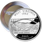 Round silver-toned West Virginia coin-style pinback with New River Gorge, 2005 text