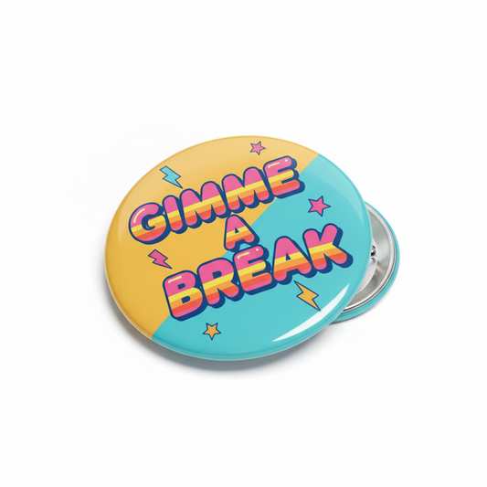 Gimme a Break pinback button, two-tone yellow and teal with colorful lettering