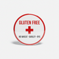 Gluten-free pinback button, red rim, text 'NO WHEAT BARLEY RYE'.