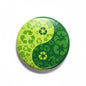Green yin yang recycling pinback button with circular symbol detail