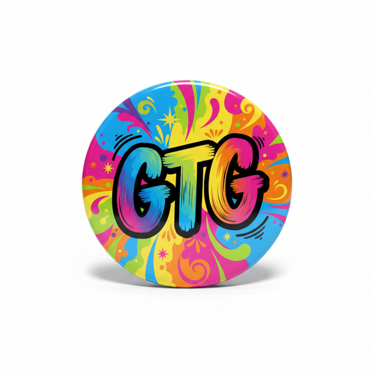 Colorful 2.25-inch round pinback button with bold "GTG" graphic