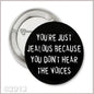 2.25-inch pinback button with black face and white text: “YOU'RE JUST JEALOUS BECAUSE…”