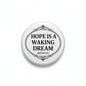 Round pinback button with “HOPE IS A WAKING DREAM” and ARISTOTLE text