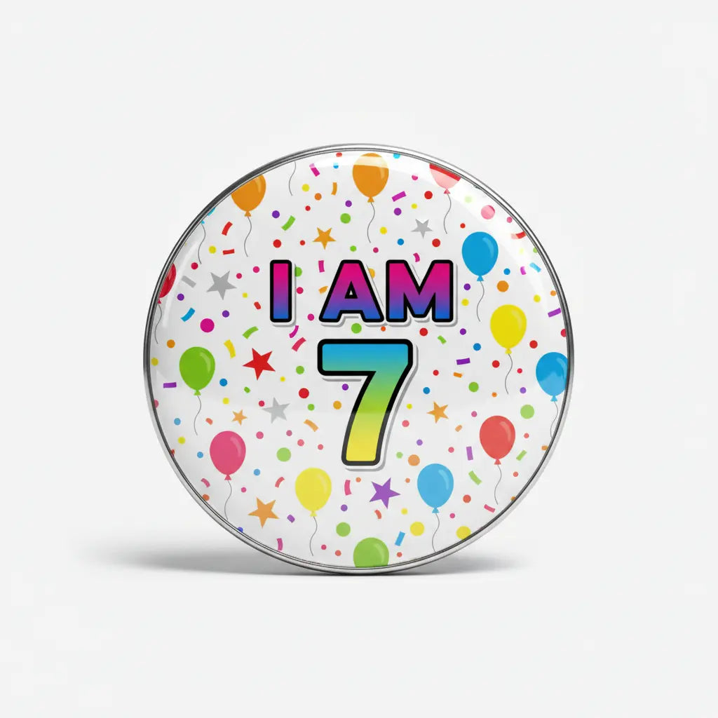 Age 7 birthday pinback with 'I AM 7' text, balloons and confetti