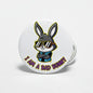 2.25-inch Bad Bunny pinback button with sunglasses bunny and “I AM A BAD BUNNY”