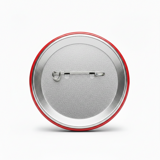 Round pinback button back with silver clasp and red rim, visible safety pin
