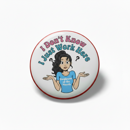 Button badge with cartoon character and text 'I Don't Know, I Just Work Here' on a white background