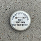 2.25-inch pinback button with safety pin and bold quote text, round silver border