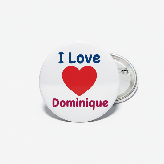 Round pinback button: white face with “I Love Dominique” and red heart, silver back