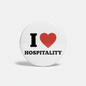 2.25-inch pinback button: white 'I HOSPITALITY' with red heart