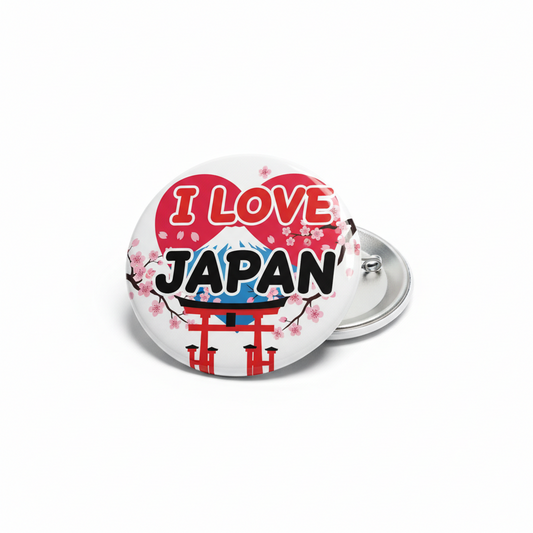 1.25-inch round pinback button with I Love Japan text and cherry blossom graphic