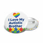 Autism pinback button with rainbow heart, puzzle pieces, and 'I Love My Autistic Brother' text.