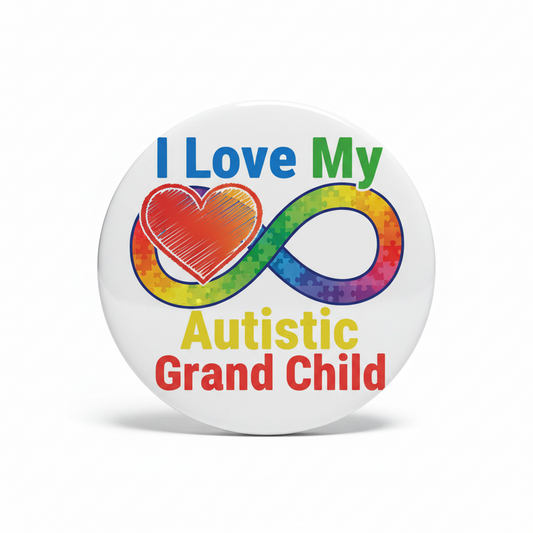 White pinback button with heart graphic and text 'Autistic Grand Child'.