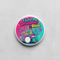 2.25-inch round button pin with colorful drummer chick illustration and text
