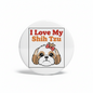 A round white button badge featuring a cartoon Shih Tzu dog with a red polka-dot bow and the text 'I Love My Shih Tzu' in red and orange lettering, shown on a clean white background.