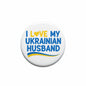 Round pinback button: 'I LOVE MY UKRAINIAN HUSBAND' with blue/yellow flag wave