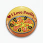 Paella pinback button with colorful seafood graphic and “I Love Paella” text