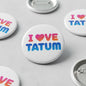 White round pinback button reading 'I LOVE TATUM' in pink and blue