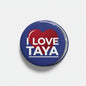 Blue round pinback brooch with red heart and 'LOVE TAYA' lettering