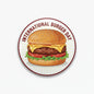 International Burger Day pinback button with illustrated burger and circular text