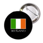Ireland flag pinback badge, circular black face with Irish tricolor and 'IRELAND'.
