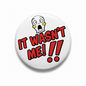Pinback button with cartoon dog and red "IT WASN'T ME!!" text