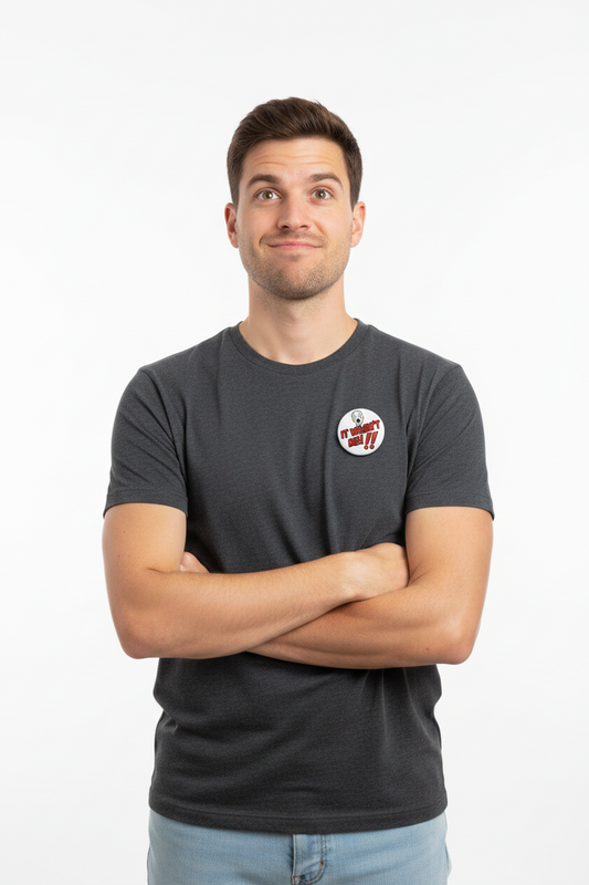 Pinback button pinned to a charcoal gray T-shirt chest