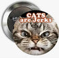 2.25-inch round cat pinback badge with “Cats are Jerks” text