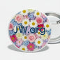 JW.org round pinback button with colorful flower design and JW.org text