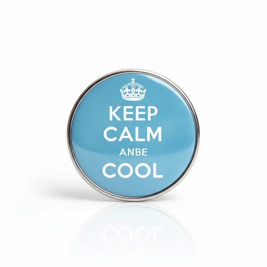 Teal round pinback button with crown and 'KEEP CALM ANBE COOL' text