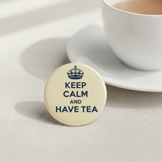 Round beige pinback button with crown and text 'Keep Calm and Have Tea'.
