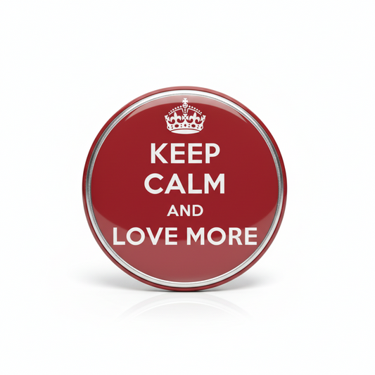 Red circular pinback button with crown icon and 'KEEP CALM AND LOVE MORE' text