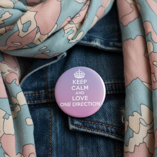 Round lavender pinback button with crown and text: Keep Calm and Love One Direction