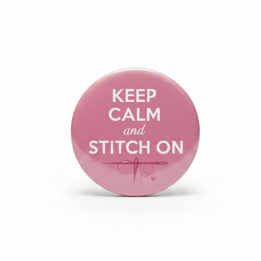 Pink 2.25-inch pinback button with 'KEEP CALM and STITCH ON' text